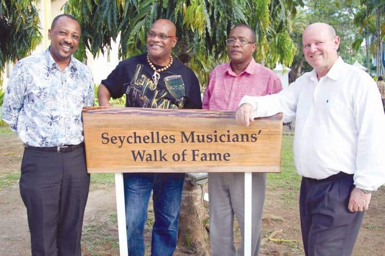 peter_sinon - International Magazine Kreol From left to right: Peter Sinon, Seychelles Minister for Natural Resources, Dédé Saint Prix,Martinican singer of traditional chouval bwa music, Michel Marie and Alain St. Ange, Seychelles Minister of Tourism and Culture