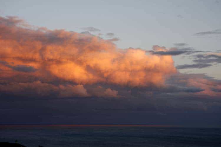 Another shot opposite the sunset; with the clouds reflected off the water. - International Magazine Kreol Another shot opposite the sunset; with the clouds reflected off the water.