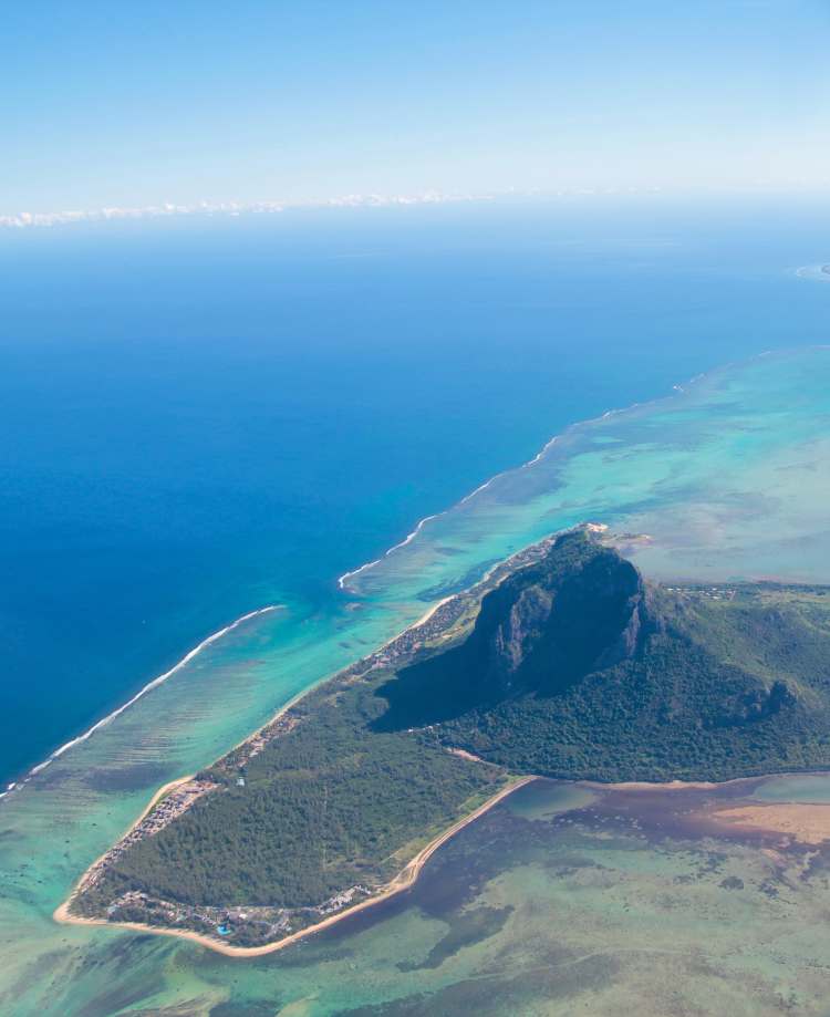 Aerial view of Mauritius with Le Morne Brabant mountain - International Magazine Kreol Aerial view of Mauritius with Le Morne Brabant mountain