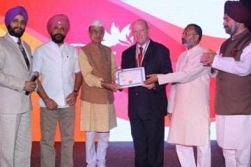 Alan St Ange presented with award in India