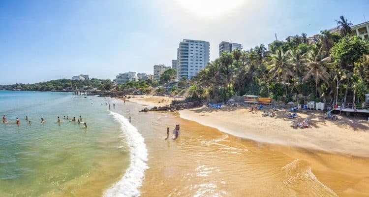 Explore! - Where would you go next? - International Magazine Kreol Tourists and the local residents of Dakar