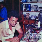 Alex Faure - International Magazine Kreol Alex Faure repairing a TV