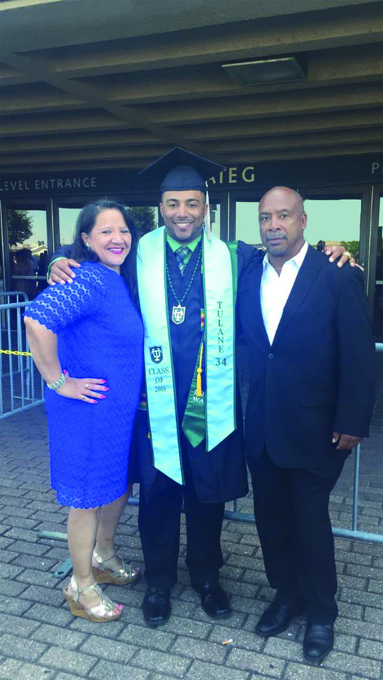 Proud parents - International Magazine Kreol Proud parents take a picture with their son, Richard, after he graduated College, with numerous honors