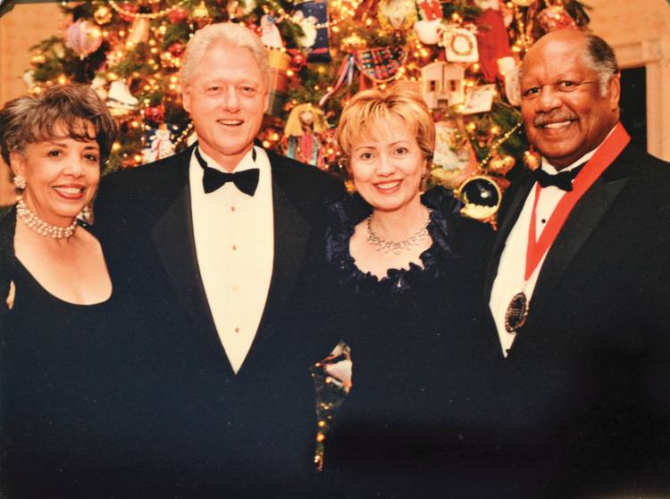 Ernest Gaines - International Magazine Kreol Receiving the National Humanities Medal from President Clinton. Ernest Gaines (right) with his wife, Dianne Saulney (left), President William Jefferson Clinton and Hilary Clinton