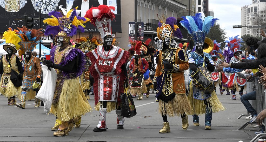 mardi-gras - International Magazine Kreol Festival goers celebrating through the roads dressed in colourful attire
