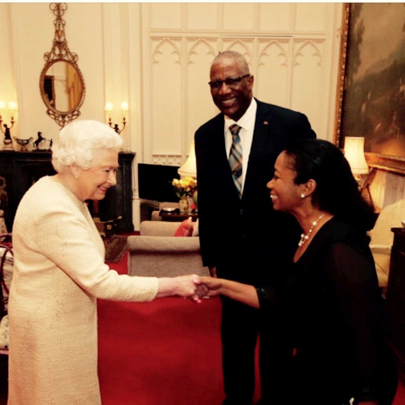H.E Lady Sandra Williams Cover Image - International Magazine Kreol Her Excellency Lady Sandra Williams & His Excellency Sir Rodney Williams greated by Her Majesty Queen Elizabeth II