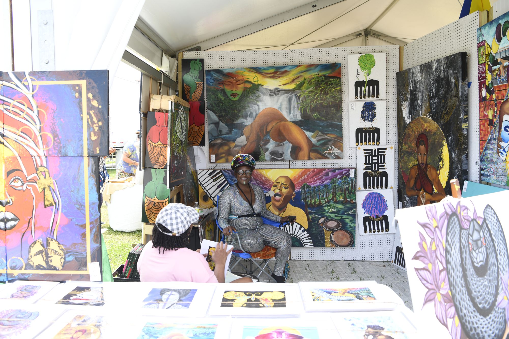 New Orleans Jazz Festival Art Stalll - International Magazine Kreol New Orleans Jazz Festival Artist sat at Art Stall, Creole