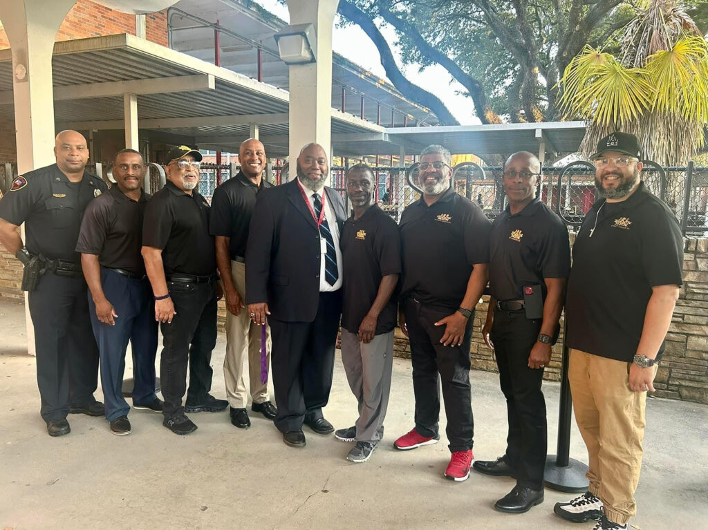 Brent P. Broussard - International Magazine Kreol The 100 Black Men of Greater Lafayette, Inc. and Northside High School Principal Perry Myles welcoming students back to school on the first day.
