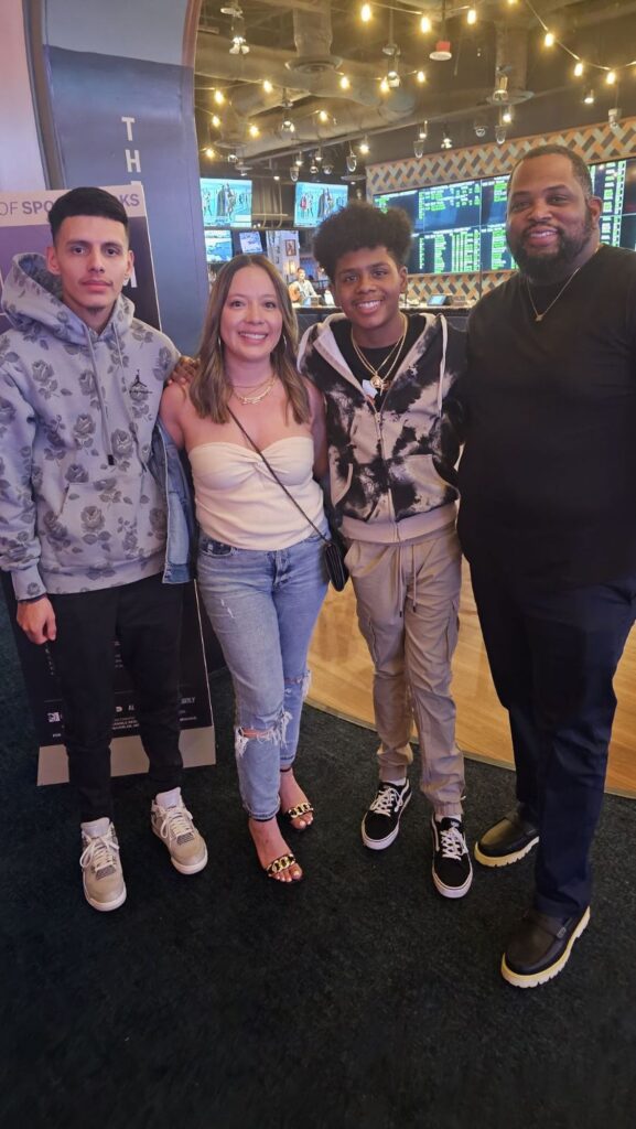 Grandson Fabian, daughter-in-law Karla, grandson Kristian, and youngest son Kristopher Andrus. - International Magazine Kreol Chris Andrus