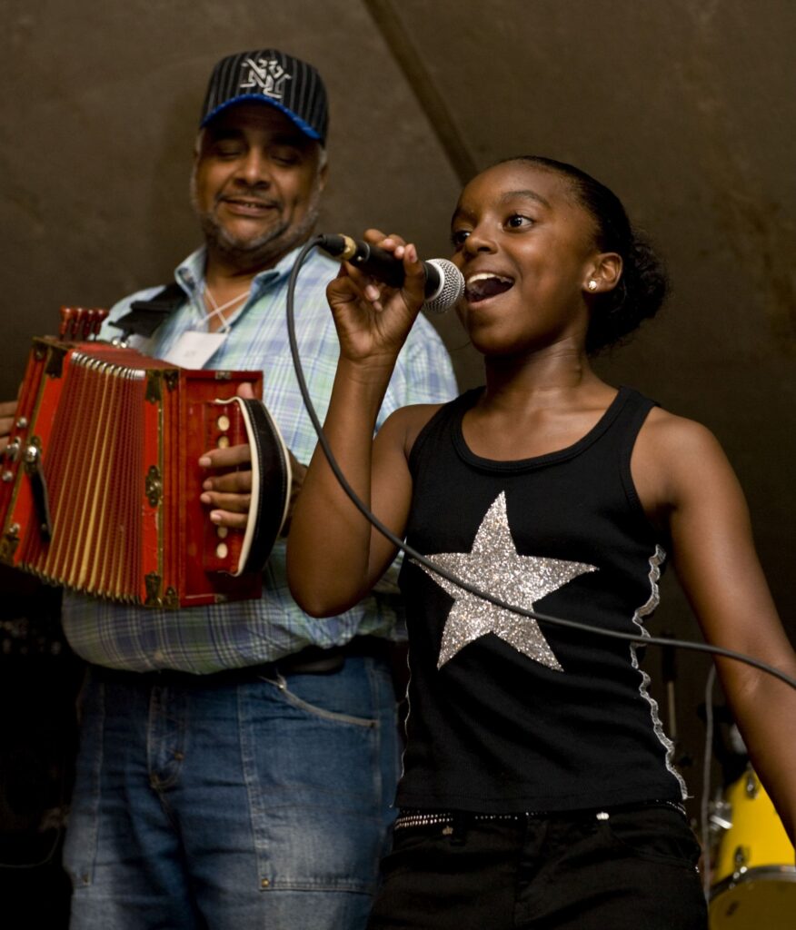 Julie Frank (with Preston Frank), Balfa camp, 2008 - International Magazine Kreol Preston Frank