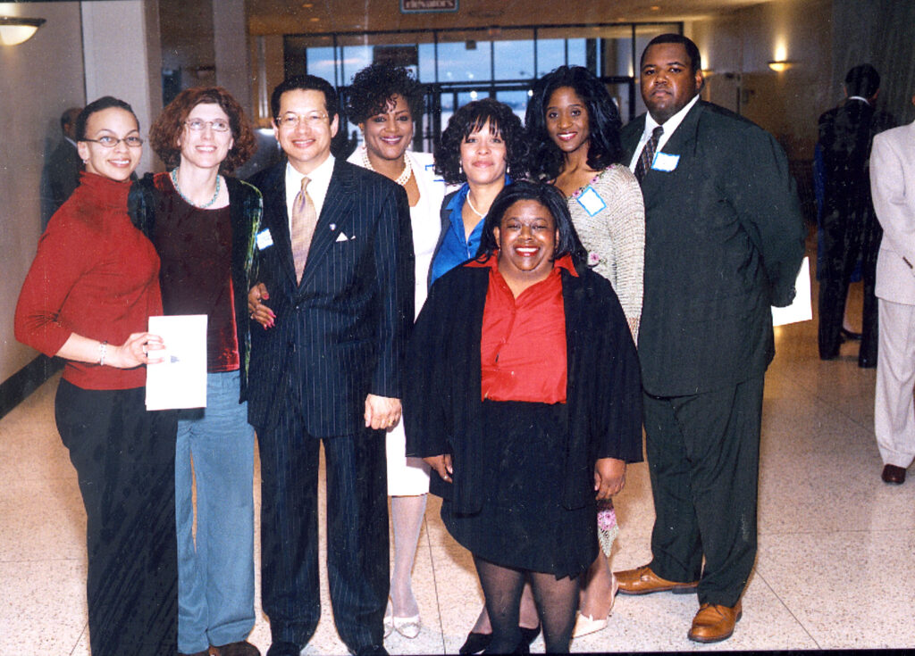 Judge_Thibo063 - International Magazine Kreol Thibodeax with former Law Clerks and staff at chief judge swearing in ceremony, April, 2004