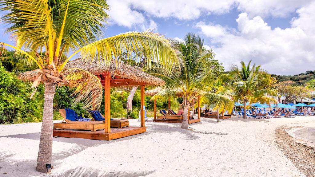 The beach and pier at The Bight on Norman Island, BVI. - International Magazine Kreol The beach and pier at The Bight on Norman Island, BVI.